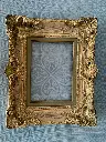 Ancien cadre en bois et stuc doré
