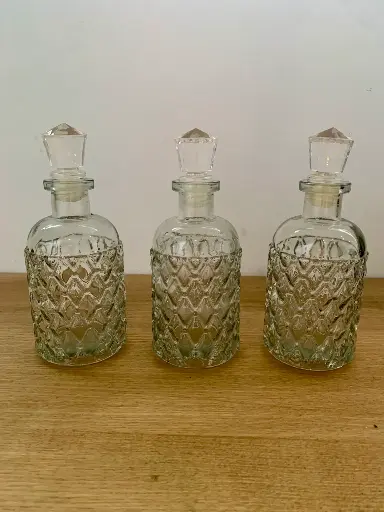 Ensemble de trois flacons à parfum